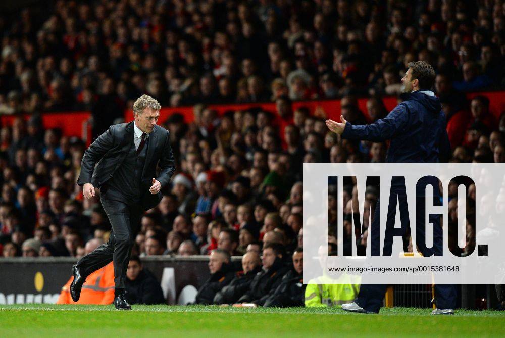 David Moyes manager of Manchester United chases after the ball in desperation - Barclays Premier League - Manchester Utd vs Tottenham - Old Trafford Stadium - Manchester - England - 1st January 2014 - Picture Simon Bellis Sportimage .