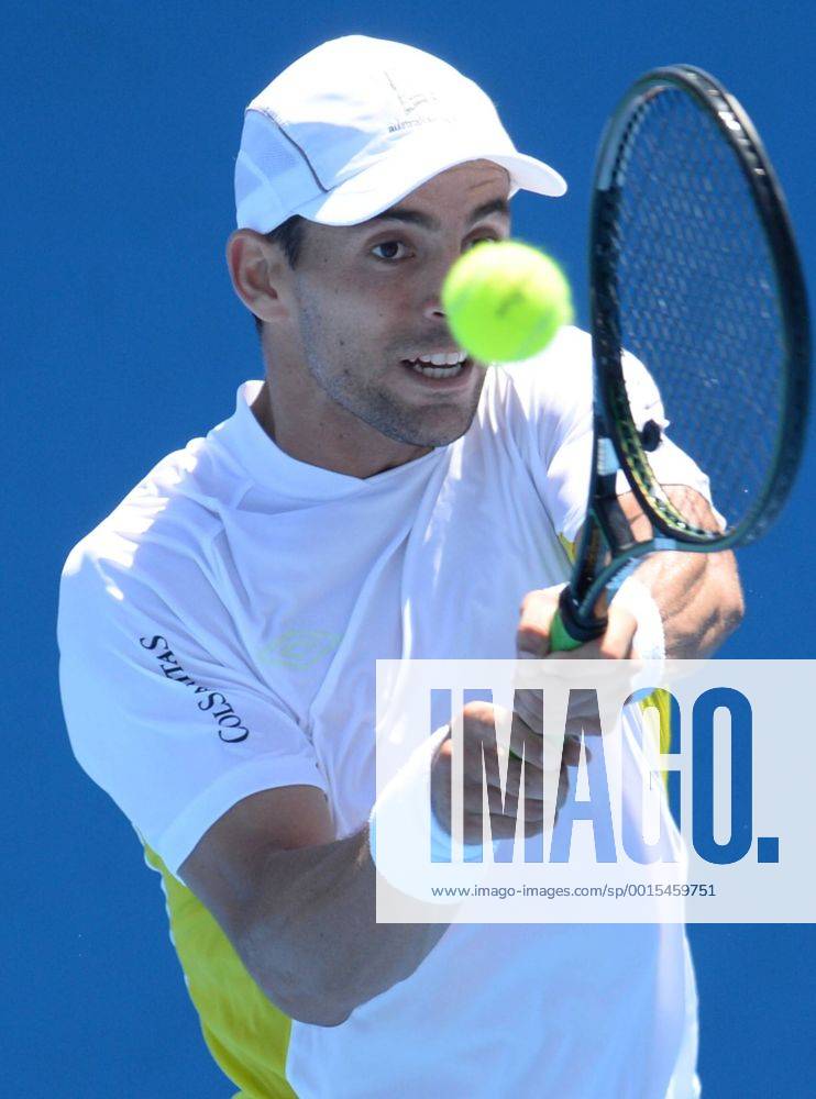 (140113) -- MELBOURNE, Jan. 13, 2014 (Xinhua) -- Colombia s Santiago Giraldo plays a shot during his men s singles match on day one of the 2014 Australian Open tennis tournament in Melbourne on January 13, 2014. (Xinhua Li Jundong) (SP)AUSTRALIA-MELBOURNE-TENNIS-AUSTRALIA OPEN