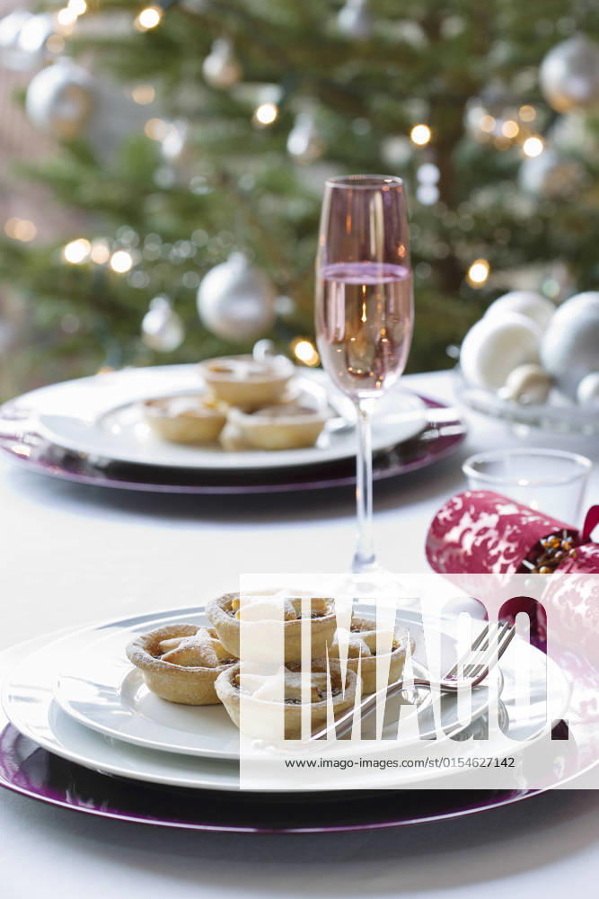 Christmas Mince Pies , 10101052.jpg, Celebration, Champagne, Christmas, Concept, Cracker, Culture, Cutlery, December, Decoration, Dessert, Dining, Elegance, Eve, Festive, Flute, Food, Holiday, Home, House, Indoors, Interior, London, Luxury, Merry, Mince Pie, New, Nobody, Object, Plate, Refreshment, Room, Season, Seasonal, Snack, Still, Table, Traditional, Variation, Vertical, Winter, Wintertime, Xmas, Year, Celebrating,
