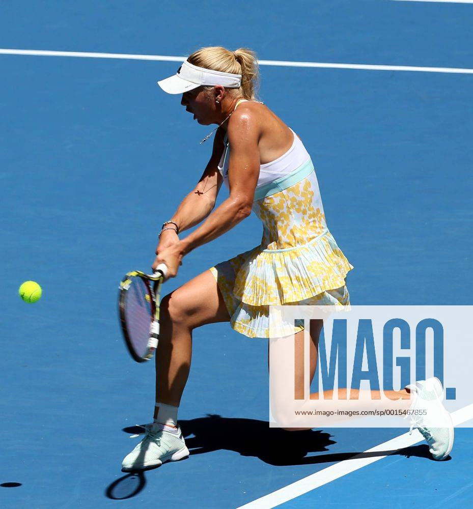 (140114) -- MELBOURNE, Jan. 14, 2014 (Xinhua) -- Caroline Wozniacki of Denmark hits a return during her women s singles first round match against Lourdes Dominguez Lino of Spain at 2014 Australian Open tennis tournament in Melbourne, Australia, Jan. 14, 2014. Wozniacki won 2-0. (Xinhua Li Peng) (SP)AUSTRALIA-MELBOURNE-TENNIS-AUSTRALIAN OPEN