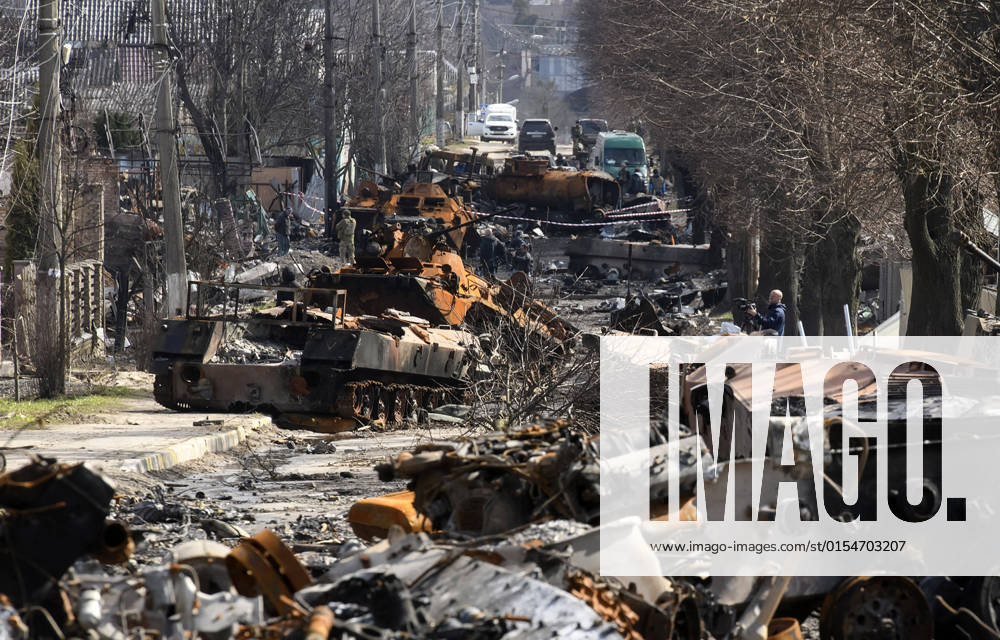 Destroyed Russian military machinery clutters a street in the recaptured city of Bucha, northwest of the Ukrainian capital Kyiv, on Monday. April 4, 2022. Ukraine and Western nations accused Russian troops of war crimes after the discovery of the mass graves and civilians who were apparently executed in Bucha. KYV2022040509978 VladyslavxMusienko