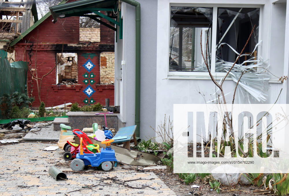 BUCHA, UKRAINE - APRIL 5, 2022 - Children s toys are pictured in the yard of a private house on Vokzalna Street following the liberation of the city from Russian invaders, Bucha, Kyiv Region, northern Ukraine. Vokzalna Street in Bucha