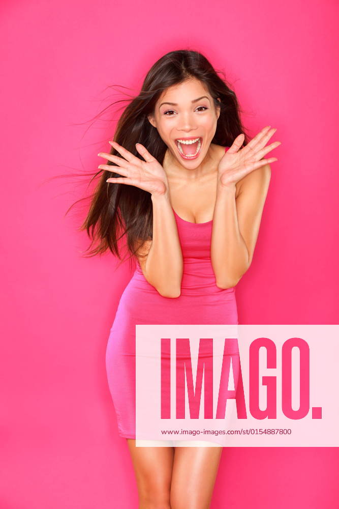 IMAGO Creative, Lifestyle, Barbiecore Excited young lady portrait. Woman celebrating success on pink background. Beautiful smiling happy mixed race Caucasian Chinese Asian brunette fashion model., model released, , 5291352.jpg, attractive, background, beautiful, beauty, brunette, caucasian, excited, fashion, funky, girl, happy, joy, joyful, lady, lifestyle, model, people, person, pink, portrait, pretty, sexy, stylish, trendy, woman, young, hot, red, girls, women, dress, gorgeous, asian, fresh, ethnicity, mixed, race, smiling, energy, energetic, chinese, surprised, surprise, cheerful, cheering, winner, winning, scream, screaming, celebrating,