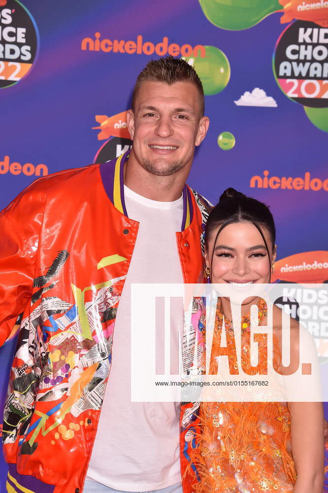 SANTA MONICA, CA - APRIL 9: Rob Gronkowski and Miranda Cosgrove at the 2022 Nickelodeon Kids Choice Awards at the Barker Hangar in Santa Monica, California on April 9, 2022.
