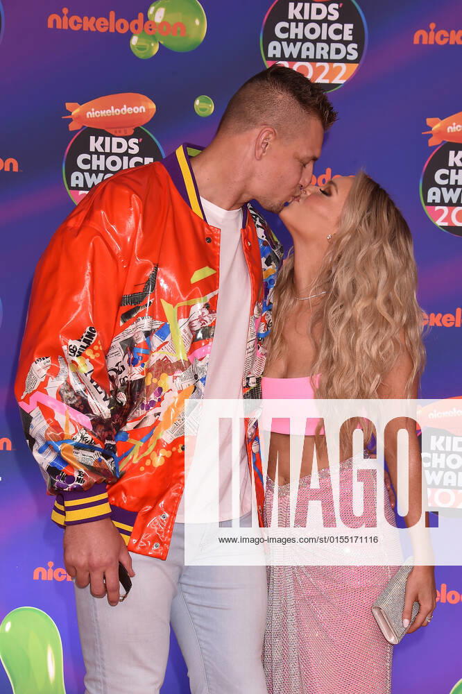 SANTA MONICA, CA - APRIL 9: Rob Gronkowski and Camille Kostek at the 2022 Nickelodeon Kids Choice Awards at the Barker Hangar in Santa Monica, California on April 9, 2022.