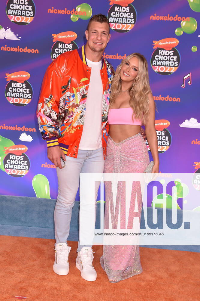 SANTA MONICA, CA - APRIL 9: Rob Gronkowski and Camille Kostek at the 2022 Nickelodeon Kids Choice Awards at the Barker Hangar in Santa Monica, California on April 9, 2022.