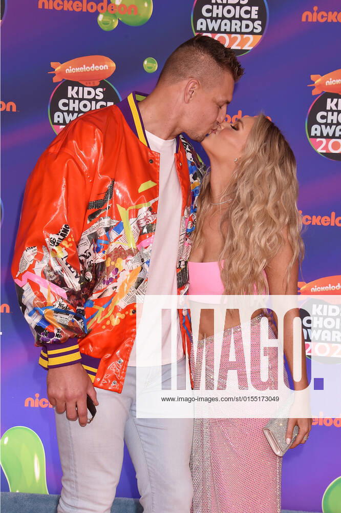 SANTA MONICA, CA - APRIL 9: Rob Gronkowski and Camille Kostek at the 2022 Nickelodeon Kids Choice Awards at the Barker Hangar in Santa Monica, California on April 9, 2022.
