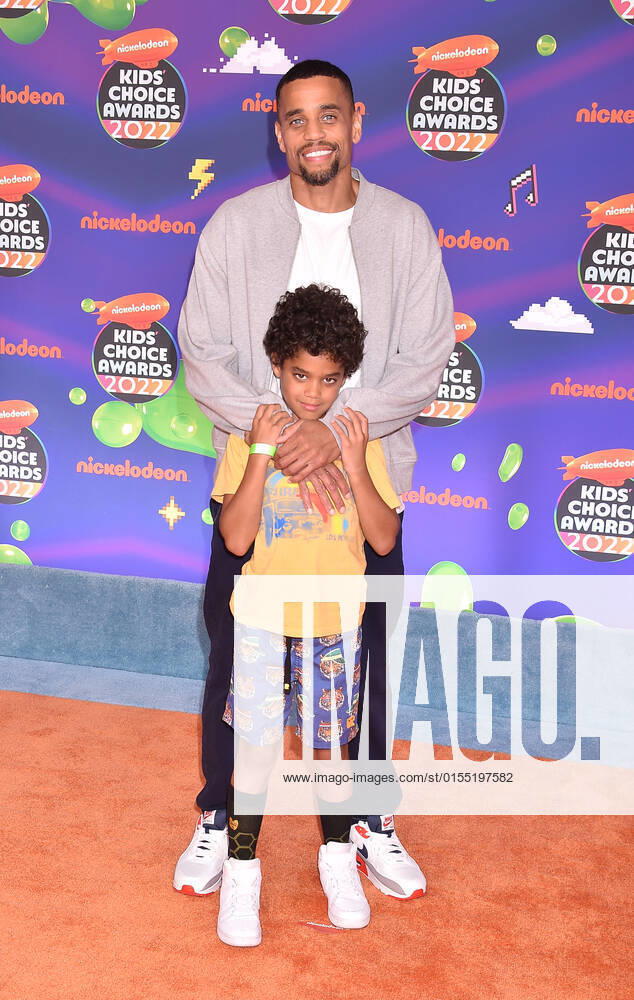 SANTA MONICA, CA - APRIL 9: Michael Ealy and Elijah Brown at the 2022 Nickelodeon Kids Choice Awards at the Barker Hangar in Santa Monica, California on April 9, 2022.