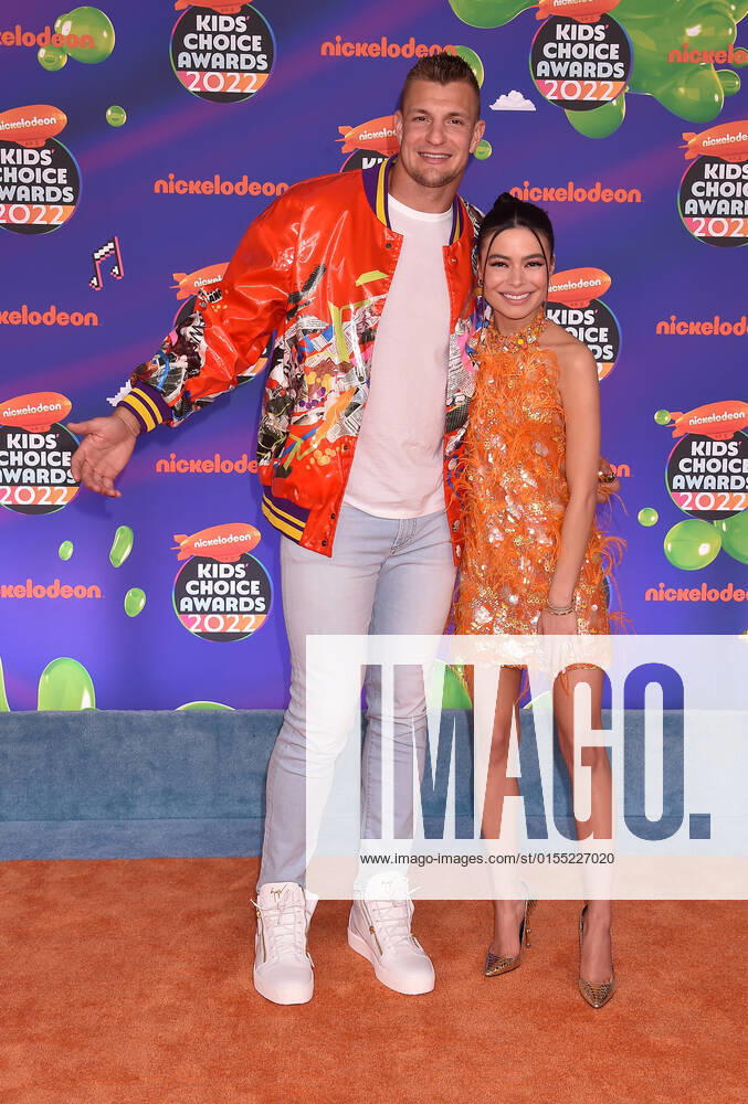 SANTA MONICA, CA - APRIL 9: Rob Gronkowski and Miranda Cosgrove at the 2022 Nickelodeon Kids Choice Awards at the Barker Hangar in Santa Monica, California on April 9, 2022.