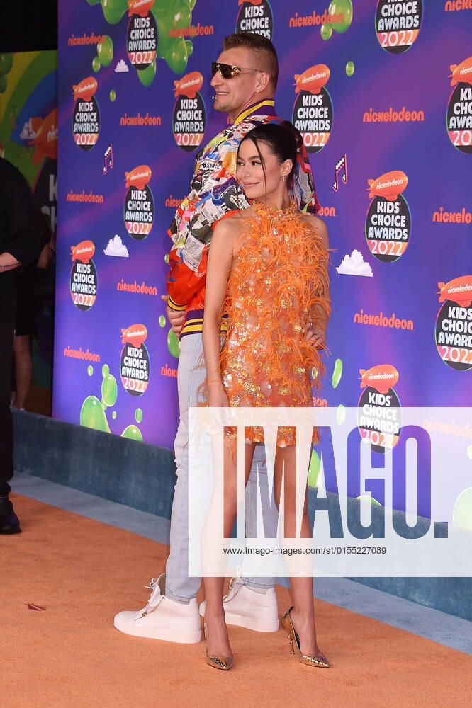 SANTA MONICA, CA - APRIL 9: Rob Gronkowski and Miranda Cosgrove at the 2022 Nickelodeon Kids Choice Awards at the Barker Hangar in Santa Monica, California on April 9, 2022.