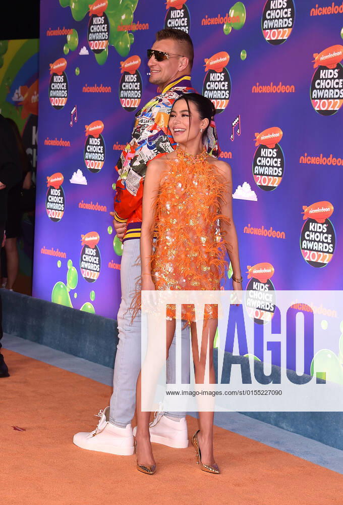 SANTA MONICA, CA - APRIL 9: Rob Gronkowski and Miranda Cosgrove at the 2022 Nickelodeon Kids Choice Awards at the Barker Hangar in Santa Monica, California on April 9, 2022.