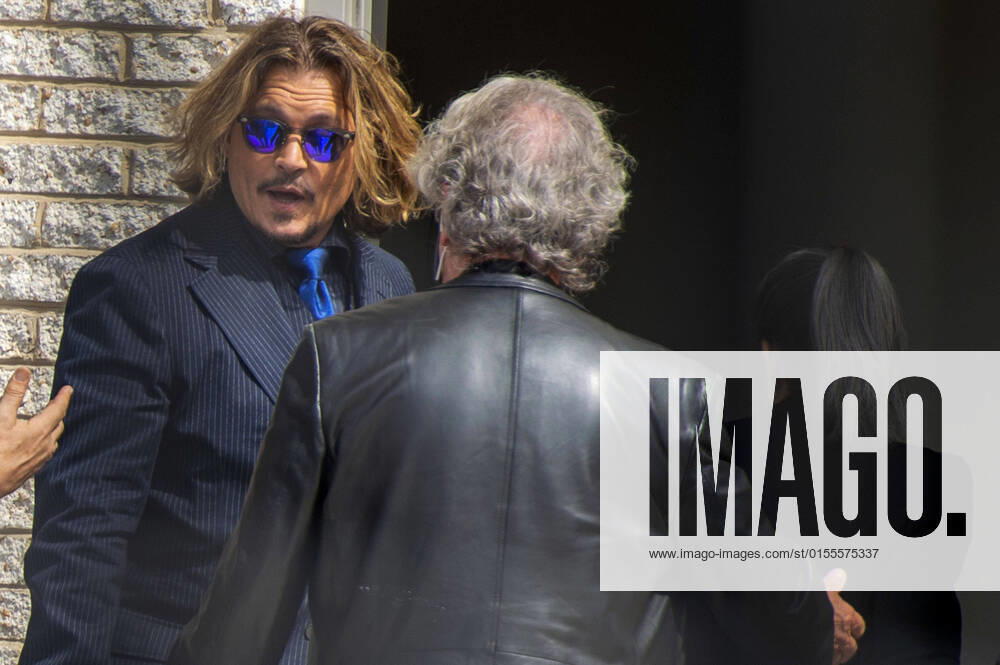 Actor Johnny Depp returns to Fairfax County Courthouse after a break during his trial against Actress Amber Heard in Fairfax, Virginia on Wednesday, April 13, 2022. Depp filed a defamation lawsuit against Heard, his former wife, after she wrote an op-ed in The Washington Post that accused Depp of domestic abuse. WAP2022041311 BONNIExCASH