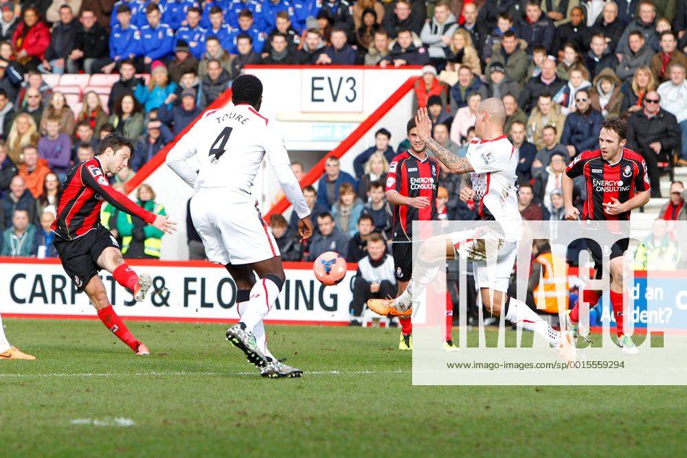 Football - 2013 2014 FA Cup - Fourth Round: AFC Bournemouth vs. FC Liverpool - Bournemouth s Harry Arter has a shot deflected for a corner by Martin Skrtel of Liverpool -