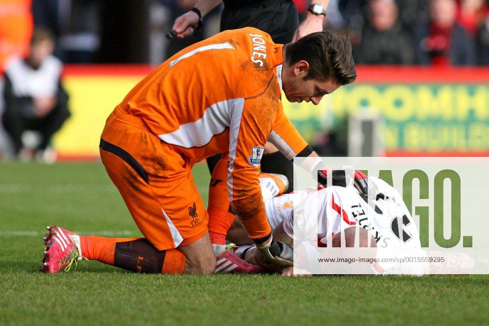 Football - 2013 2014 FA Cup - Fourth Round: AFC Bournemouth vs. FC Liverpool Martin Skrtel of Liverpool lies in the penalty area with a head wound at Dean Court The Goldsands Stadium -
