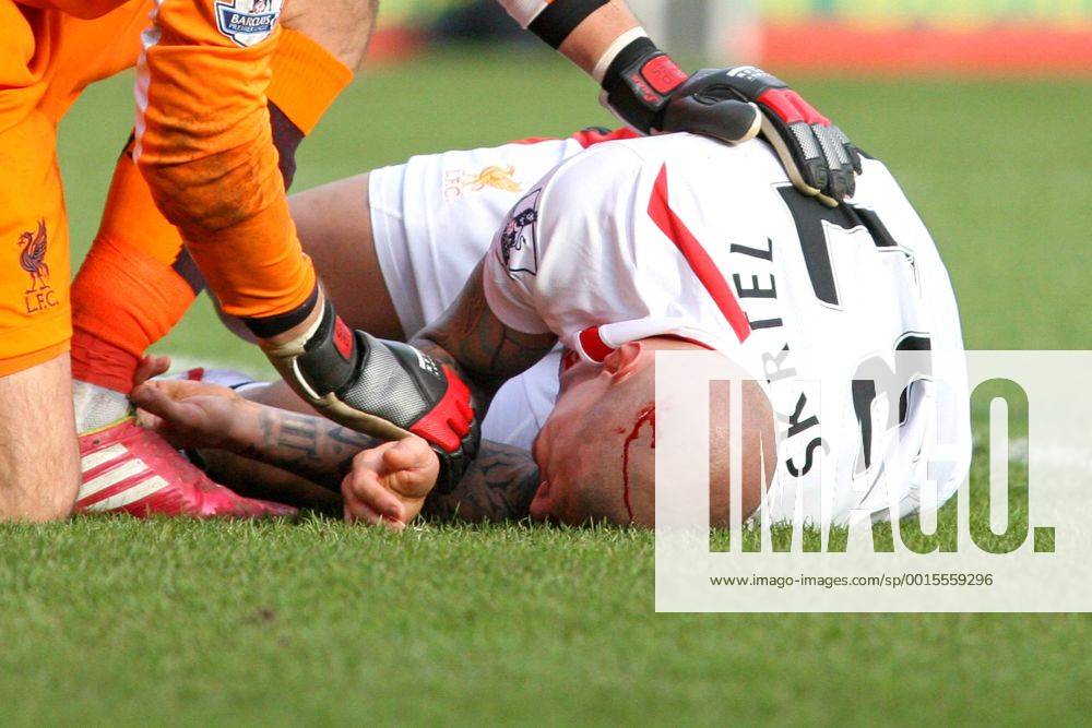 Football - 2013 2014 FA Cup - Fourth Round: AFC Bournemouth vs. FC Liverpool Martin Skrtel of Liverpool lies in the penalty area with a head wound at Dean Court The Goldsands Stadium -
