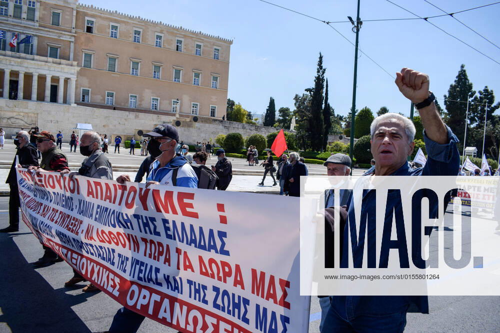 Greece: Thousands take to Athens streets in protest of price hikes Pensioners protest ahead of the Parliament holding banner that reads: No involvement of Greece in the war. Increase wages and pensions. Decrease prices of basic needs Athens Greece