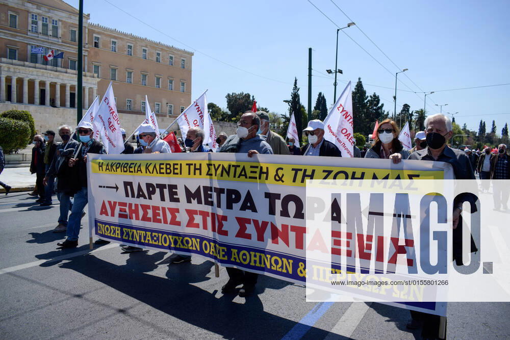 Greece: Thousands take to Athens streets in protest of price hikes Pensioners protest ahead of the Parliament holding banner that reads: Soaring prices steal our pensions and our lives! Take measures now! Athens Greece