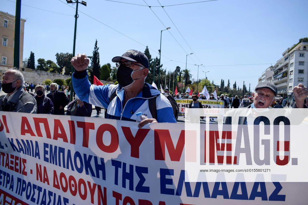 Greece: Thousands take to Athens streets in protest of price hikes Pensioners protest holding banner that reads: No involvement of Greece in the war. Increase wages and pensions. Decrease prices of basic needs Athens Greece