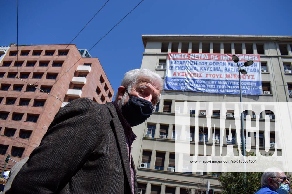 Greece: Thousands take to Athens streets in protest of price hikes Activists hang a giant banner in the facade of the Ministry of Development with slogans against price hikes while thousands protest in the streets. Athens Greece