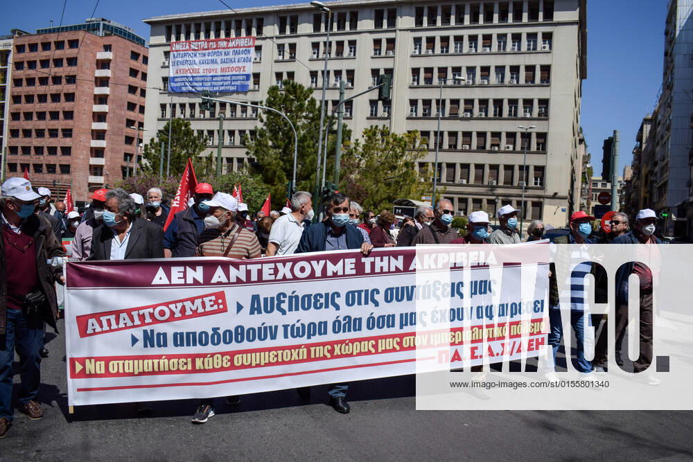 Greece: Thousands take to Athens streets in protest of price hikes Pensioners protest marching in the streets holding banner that reads: We Cannot Stand Price Hikes! Increase our pensions! No involvement of Greece in the war! Athens Greece