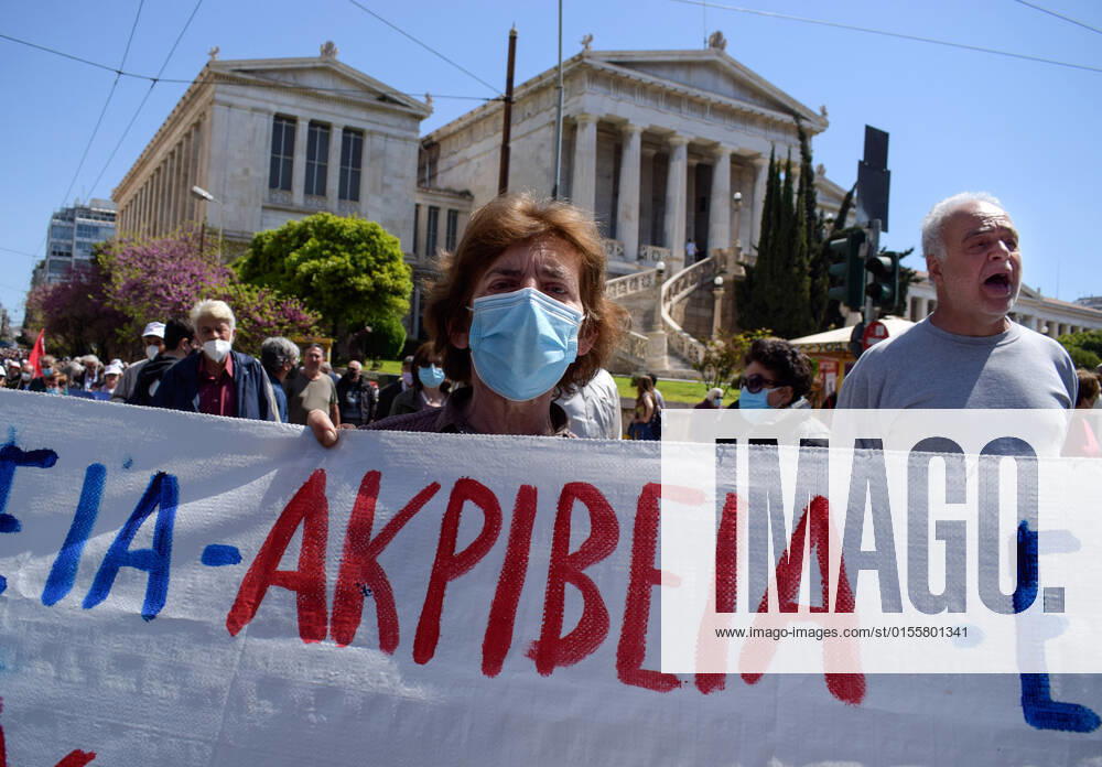 Greece: Thousands take to Athens streets in protest of price hikes Senior woman pensioner seen marching holding a banner that reads Price Hikes in protest of soaring unbearable prices that plague Greek society. Athens Greece
