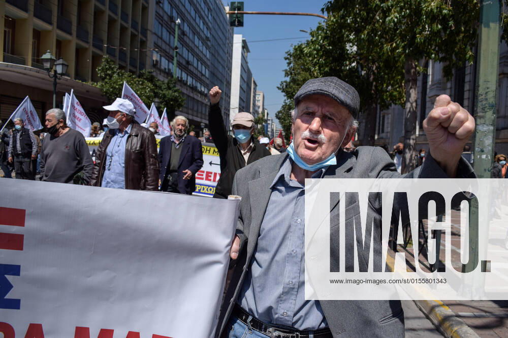 Greece: Thousands take to Athens streets in protest of price hikes A pensioner gestures as thousands march holding banner with slogans against soaring unbearable prices that plague Greek society. Athens Greece