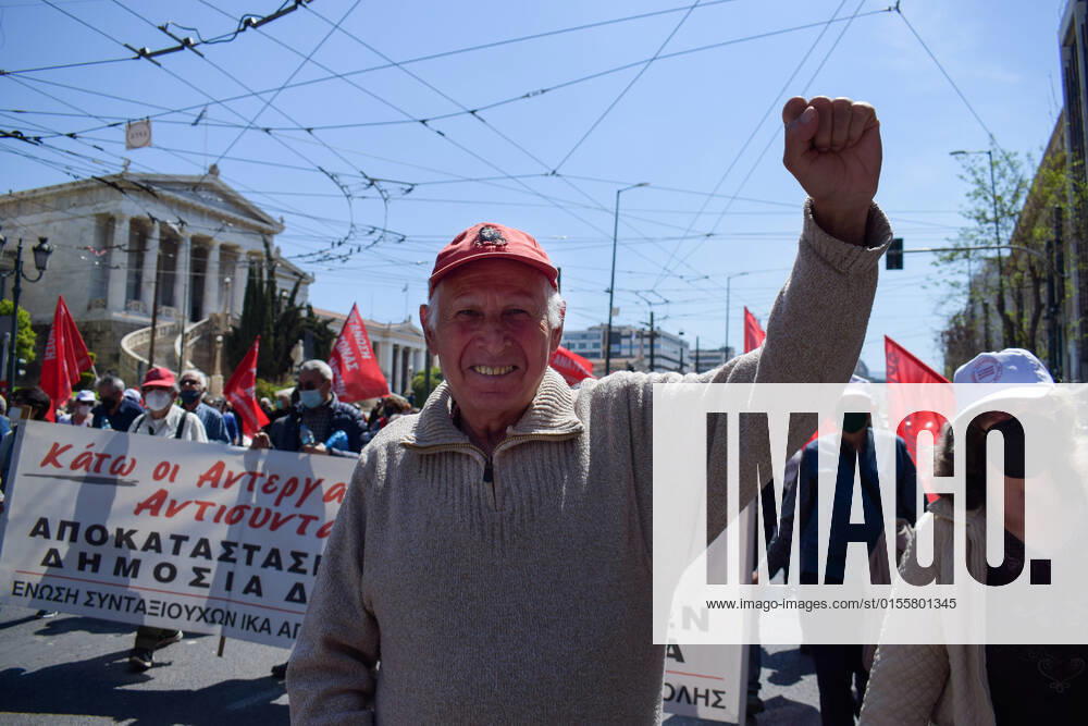 Greece: Thousands take to Athens streets in protest of price hikes A pensioner gestures as thousands march holding banner with slogans against soaring unbearable prices that plague Greek society. Athens Greece