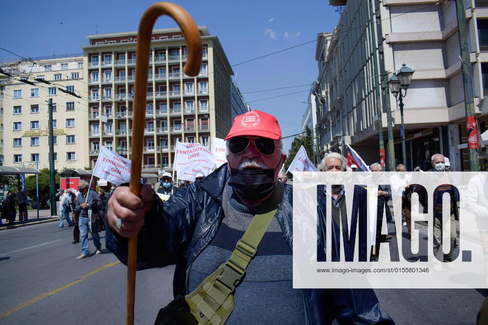 Greece: Thousands take to Athens streets in protest of price hikes A pensioner gestures as thousands march holding banner with slogans against soaring unbearable prices that plague Greek society. Athens Greece