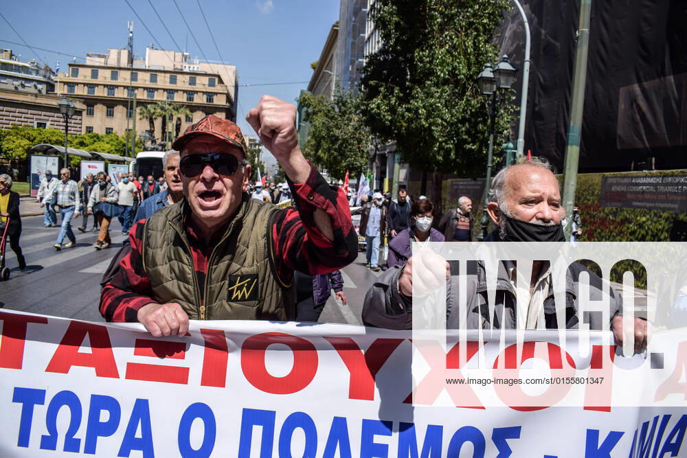 Greece: Thousands take to Athens streets in protest of price hikes Pensioners protest holding banner that reads: No involvement of Greece in the war. Increase wages and pensions. Decrease prices of basic needs Athens Greece
