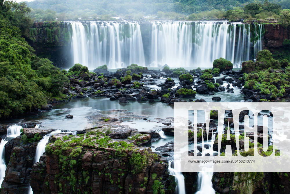 Iguassu Falls, the largest series of waterfalls of the world, located at the Brazilian and Argentinian border, View from Brazilian side , 12503600.jpg, falls, iguazu, america, south, argentina, iguassu, brazil, view, iguasu, green, forest, tourism, greatness, tree, destination, fissure, park, national, river, travel, cataratas, wonder, flow, landmark, majestic, scenery, gorge, cataract, spectacular, clouds, waterfall, famous, rift, blue, outdoors, blur, huge, sky, scenic, cascade, beautiful, water, nature, environment, whitewater, landscape, jungle, exotic, natural, concept,