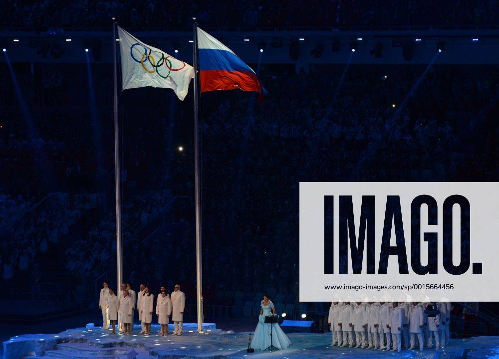 (140207) -- SOCHI, Feb. 7, 2014 (Xinhua) -- Olympic flag and Russia national flag flatter in the stadium during the opening ceremony for the 22nd Winter Olympic Games in Sochi, Russia, Feb. 7, 2014. (Xinhua Li Gang) (SP)OLY-RUSSIA-SOCHI-OPENING CEREMONY