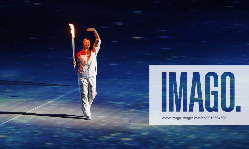 (140207) -- SOCHI, Feb. 7, 2014 (Xinhua) -- Olympic torchbearer Maria Sharapova enters the stadium during the opening ceremony for the 22nd Winter Olympic Games in Sochi, Russia, Feb. 7th, 2014. (Xinhua Fei Maohua) (SP)OLY-RUSSIA-SOCHI-OPENING CEREMONY