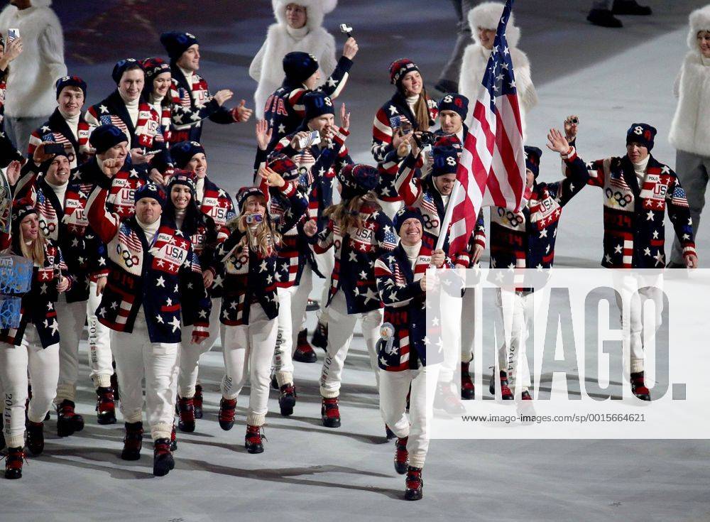 Feb. 7, 2014 - Sochi, RUS - Flag bearer Todd Lodwick and the USA team enters Fisht Olympic Stadium in Sochi, Russia, during the Opening Ceremony for the Winter Olympics, Friday, Feb. 7, 2014. Sochi Winter Olympics Opening Ceremony - ZUMAm67