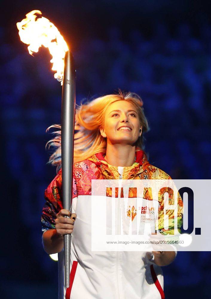 (140207) -- SOCHI, Feb. 7, 2014 (Xinhua) -- Olympic torchberaer Maria Sharapova holds the torch in the stadium during the opening ceremony for the 22nd Winter Olympic Games in Sochi, Russia, Feb. 7, 2014. (Xinhua Wang Lili) (SP)OLY-RUSSIA-SOCHI-OPENING CEREMONY