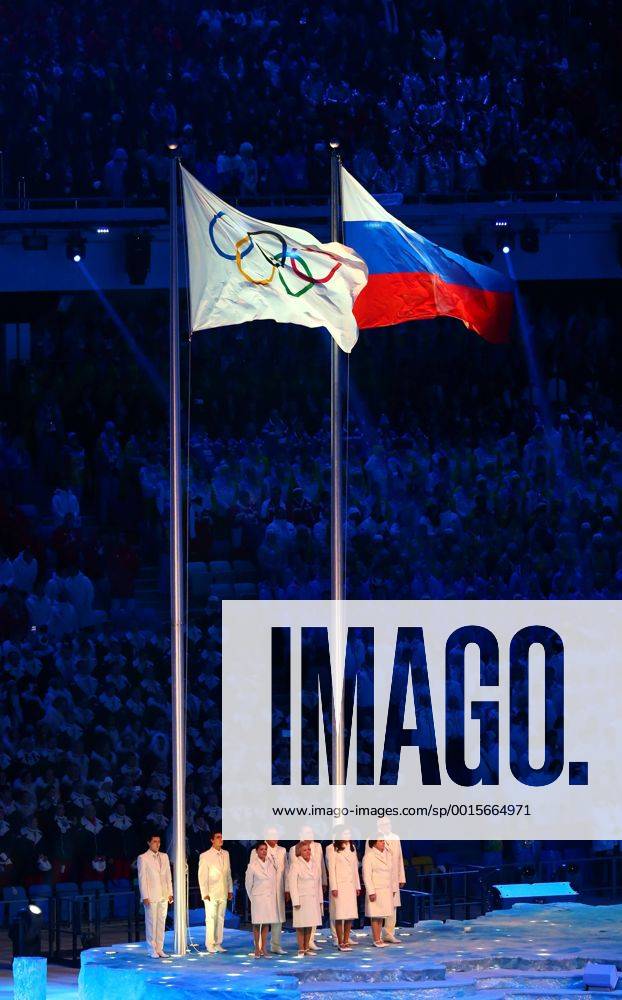 (140207) -- SOCHI, Feb. 7, 2014 (Xinhua) -- Olympic flag and Russia national flag flatter in the stadium during the opening ceremony for the 22nd Winter Olympic Games in Sochi, Russia, Feb. 7, 2014. (Xinhua Gong Bing) (SP)OLY-RUSSIA-SOCHI-OPENING CEREMONY