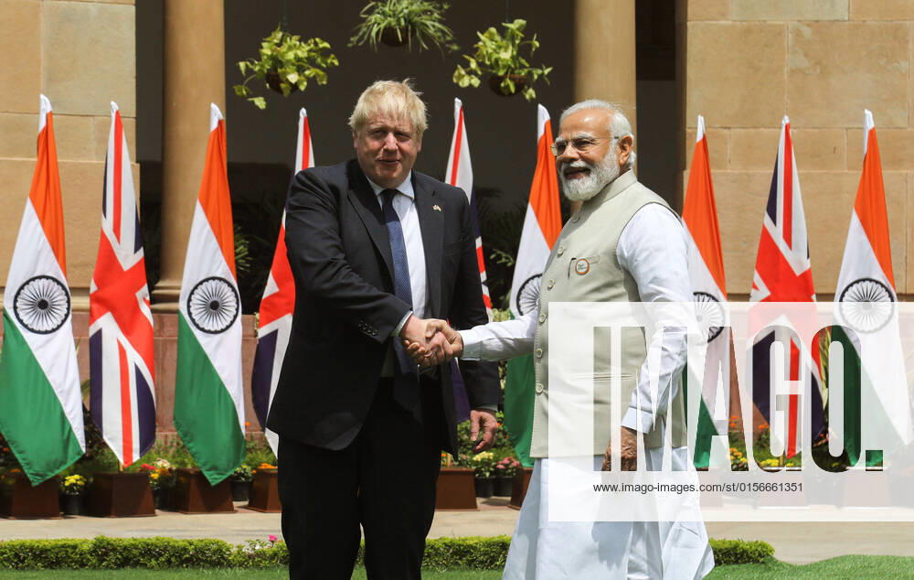 Indian Prime Minister Narendra Modi (R) and British Prime Minister Boris Johnson (L) shake hands at the Hyderabad House before their meeting in Delhi. The UK Prime Minister is on a two-day visit to India. He said India specific open general export license for defence procurement after meeting with Indian Prime Minister Narendra Modi. New Delhi India - ZUMAs197 20220422_zaa_s197_025