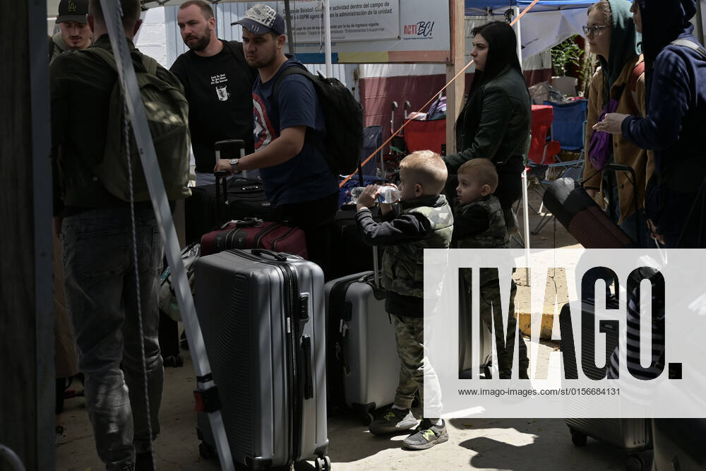 Ukrainian refugees waiting for their turn to get bused for processing to enter the U.S. at the Benito Juarez Sports Complex in Tijuana, Mexico on Thursday, April 21, 2022. ..The Biden Administration announced today that the United States will no longer accept Ukrainian refugees who arrive at the U.S.-Mexico border to seek asylum, instead they will proceeded directly when arriving only via Europe to the States...The move is expected to speed up the processing of applications for Ukrainian refugees and others fleeing war, but it will no longer routinely grant entry to anyone who shows up at the border which thousands have done so previously since the Russian invasion of Ukraine on February 24. - ZUMAm180 20220421_zip_m180_002
