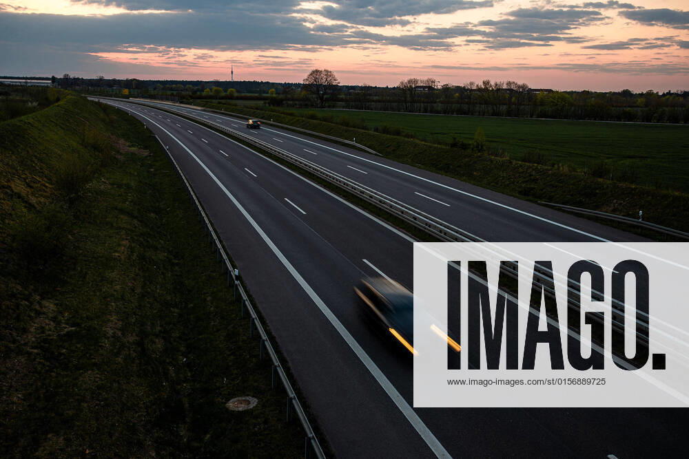 Cars on a country road in the evening of 23 April 2022 Cars on road
