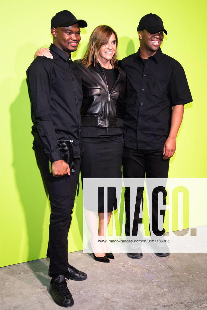 International Woolmark Prize 2022 London, UK. Carine Roitfeld (C) poses with Mmuso Potsane and Maxwell Boko of MmusoMaxwell, at the Photocall at the International Woolmark Prize 2022 FINAL in London on 26th April 2022. LMK405-S260422LSAN-001