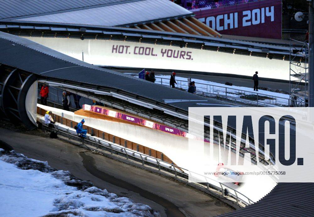 Feb. 13, 2014 - Sochi, Russia - The Italian bobsled team rounds the track during Two-Man Bobsled training at the Sanki Sliding Center at the 2014 Sochi Winter Olympics. Men s Bobsleigh - Sochi 2014 - ZUMAgh