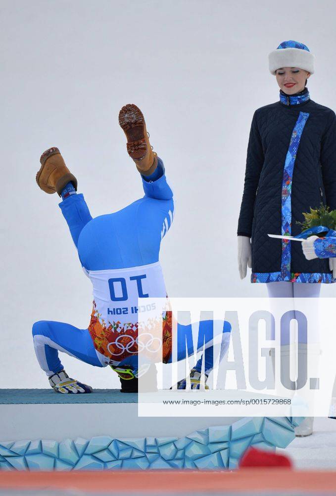 Italy s Christof Innerhofer celebrates after winning bronze in the men s super combined at the Sochi 2014 Winter Olympics on February 14, 2014 in Krasnaya Polyana, Russia. OLY20140214316