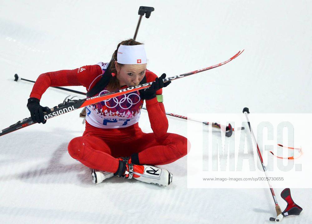 ITAR-TASS: SOCHI, RUSSIA. FEBRUARY 14, 2014. Biathlete Selina Gasparin of Switzerland kisses her ski after winning silver in the Women s 15km Individual at the Laura Ski Centre at the 22nd Winter Olympic Games. premiumd kurios RE13950B