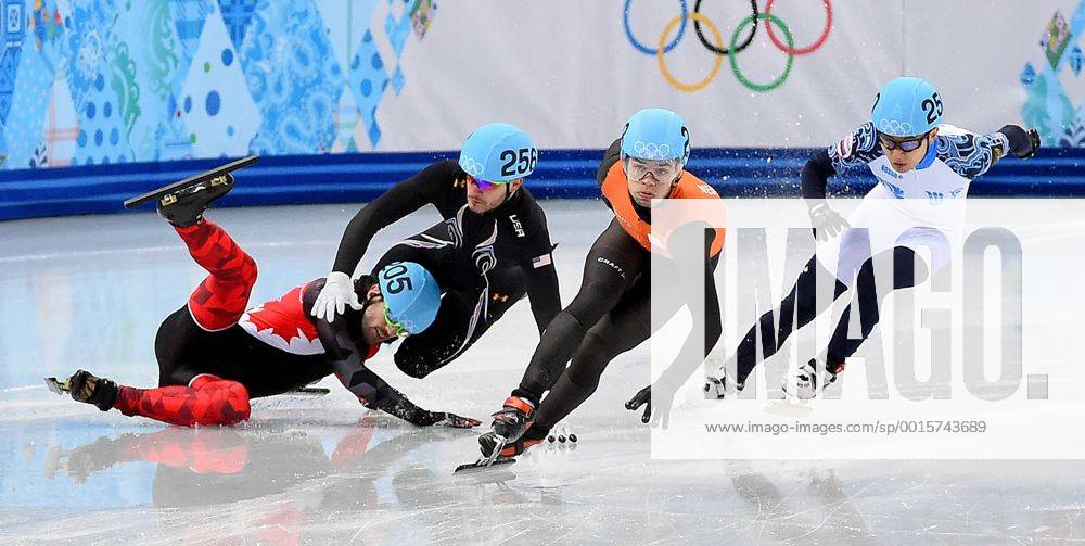 Feb. 15, 2014 - Sochi, RUS - USA s Eduardo Alvariz (256) and Canada s Charles Jamelin (205) collide and fall during the Men s 1000 meter quarterfinal race at the Iceberg Skating Palace during the Winter Olympics in Sochi, Russia, Saturday, February 15, 2014. Men s 1000 meter Short Track Speed Skating - ZUMAm67