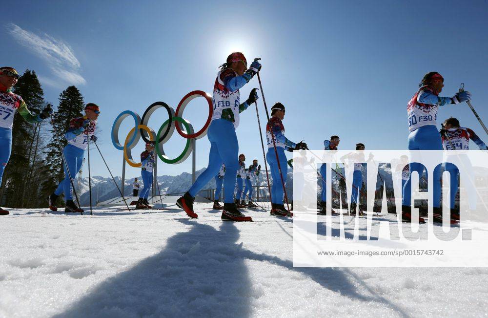 Feb. 15, 2014 - Sochi, Russia - Fore runners gather around the Olympic rings before the start of the Ladies 4 x 5km Relay Laura Cross-Country Ski & Biathlon Center at the 2014 Sochi Winter Olympics. Sweden won the gold medal. Women s Cross Country - Sochi 2014 - ZUMA Co