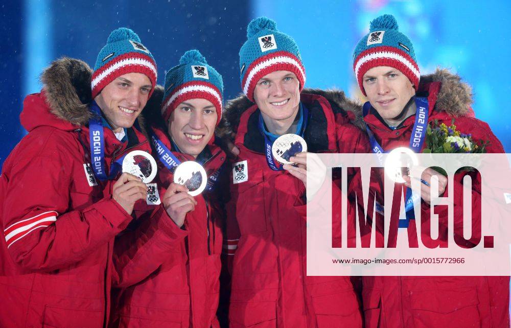 OLYMPIA - Olympische Spiele 2014 SOTSCHI,RUSSLAND,18.FEB.14 - DIVERS, OLYMPIA, SKI NORDISCH, SKISPRINGEN - Olympische Winterspiele Sotschi 2014, Grossschanze, Teambewerb der Herren, Siegerehrung, Medaillenvergabe am Medal Plaza. Bild zeigt Gregor Schlierenzauer, Thomas Diethart, Thomas Morgenstern und Michael Hayboeck (AUT). Keywords: Medaille, OEBH.