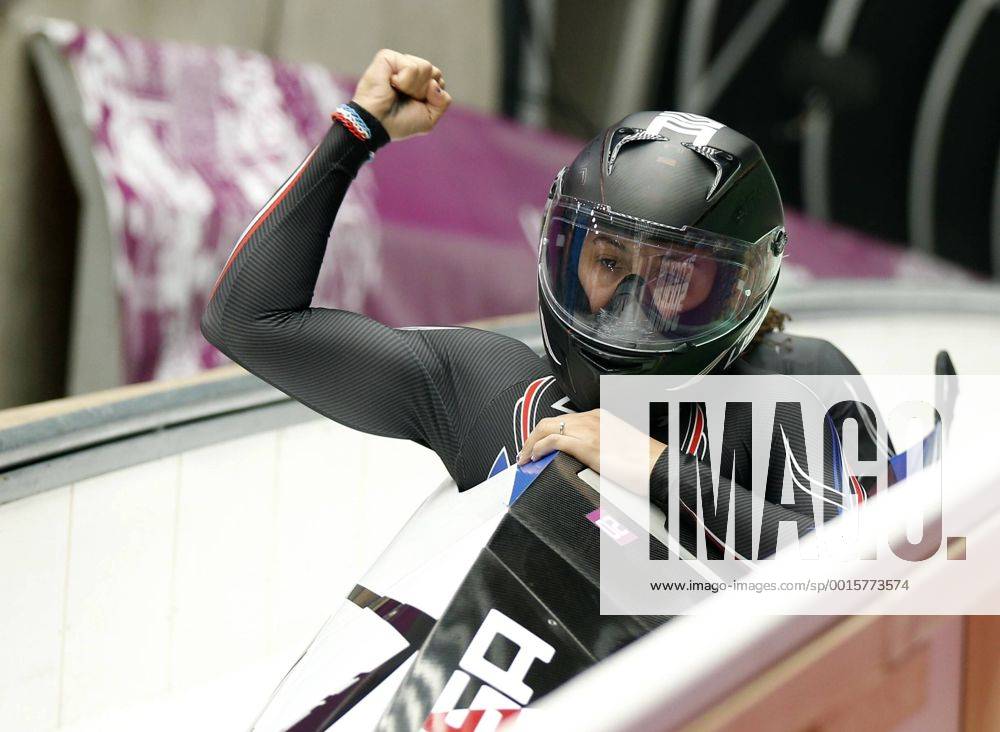 Feb. 18, 2014 - Sochi, Russia - USA-1 driver Elana Meyers celebrates with teammate Lauryn Williams after their second run in the Women s Two-Man Bobsled at the Sanki Sliding Center at the 2014 Sochi Winter Olympics. USA-1 had the top results after two runs. Women s Bobsleigh - Sochi 2014 - ZUMAsc5