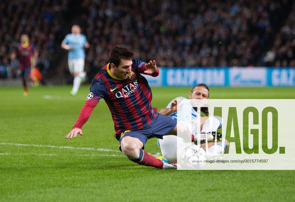 Martin Demichelis of Manchester City brings down Lionel Messi of Barcelona to earn a red card - UEFA Champions League First Knockout Round - Manchester City vs Barcelona - Etihad Stadium - Manchester - England - 18th February 2014 - Picture Phil Oldham Sportimage .