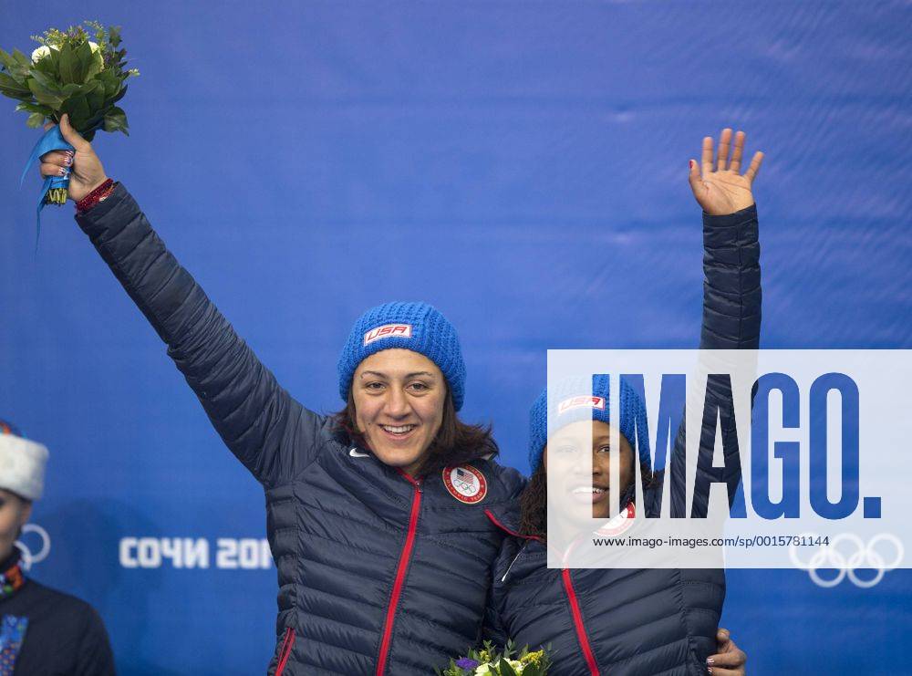 (140219) -- SOCHI, Feb. 19, 2014 (Xinhua) -- Silver medalists Elana Meyers (L) and Lauryn Williams of the United States celebrate during the flower ceremony for women s bobsleigh at the 2014 Sochi Winter Olympic Games in Sochi, Russia, Feb. 19, 2014. (Xinhua Fei Maohua) (SP)OLY-RUSSIA-SOCHI-WOMEN S BOBSLEIGH