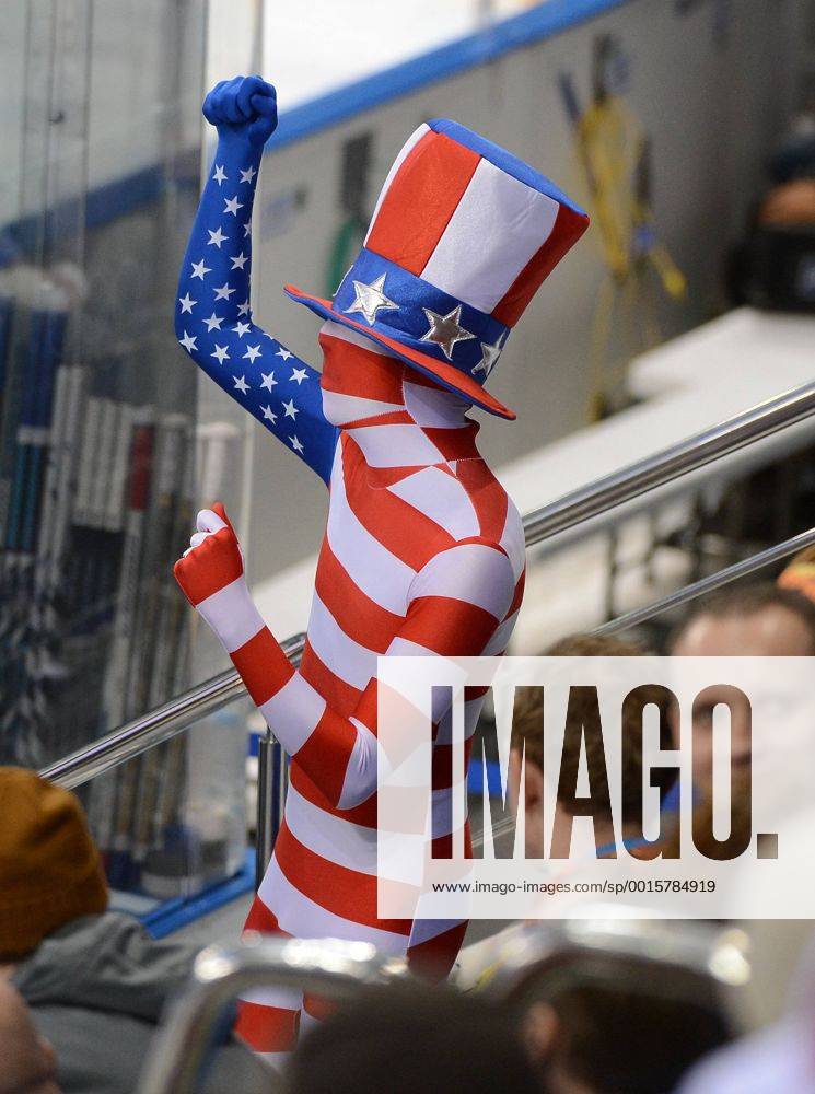 Feb. 19, 2014 - Sochi - A fan dressed in an American flag body suit dances during a break in the third period in a Winter Olympics quarterfinal game at Shayba Arena in Sochi, Wednesday, Feb. 19, 2014. - ZUMAm67