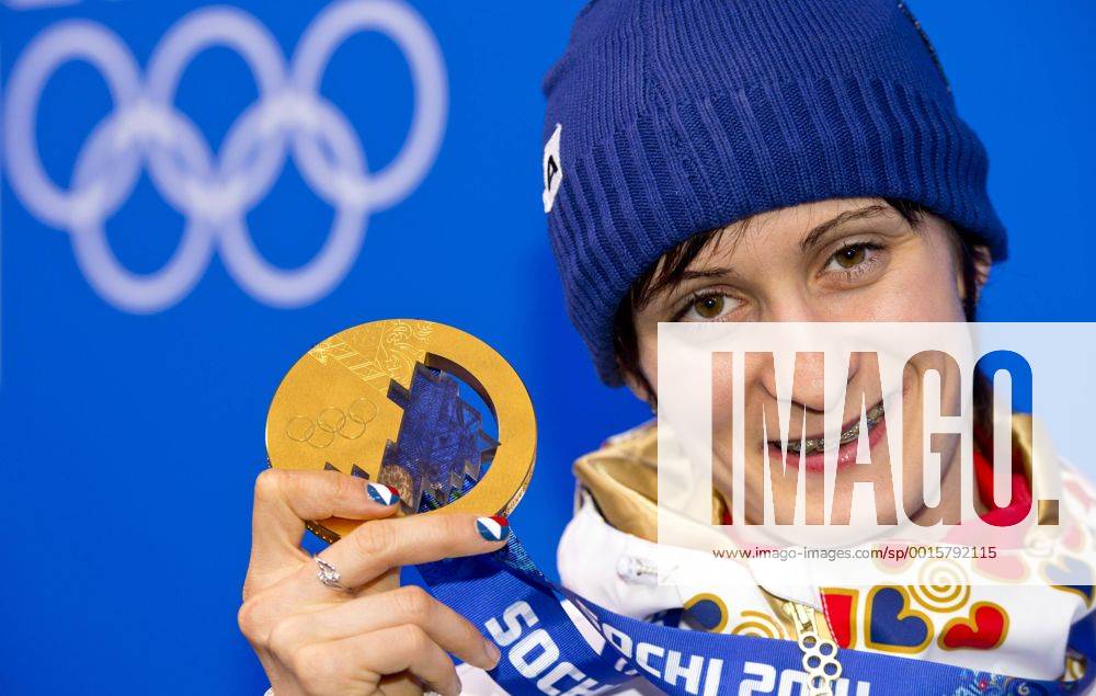 Women s 5,000-meter speedskating gold medalist Martina Sablikova of the Czech Republic poses with her medal at the 2014 Winter Olympics in Sochi, Russia, Thursday, February 20, 2014. (CTKxPhoto RomanxVondrous) CTKPhotoP201402201067501 vnd
